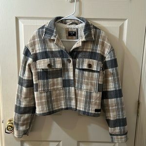 Flannel style cropped jacked. Fluffy inside.